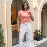 The Baby Tee — in Peachy Pink
